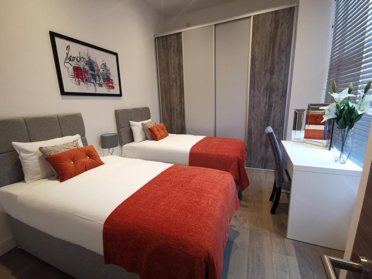 City Prime Apartments London Exterior foto A typical bedroom at the hotel