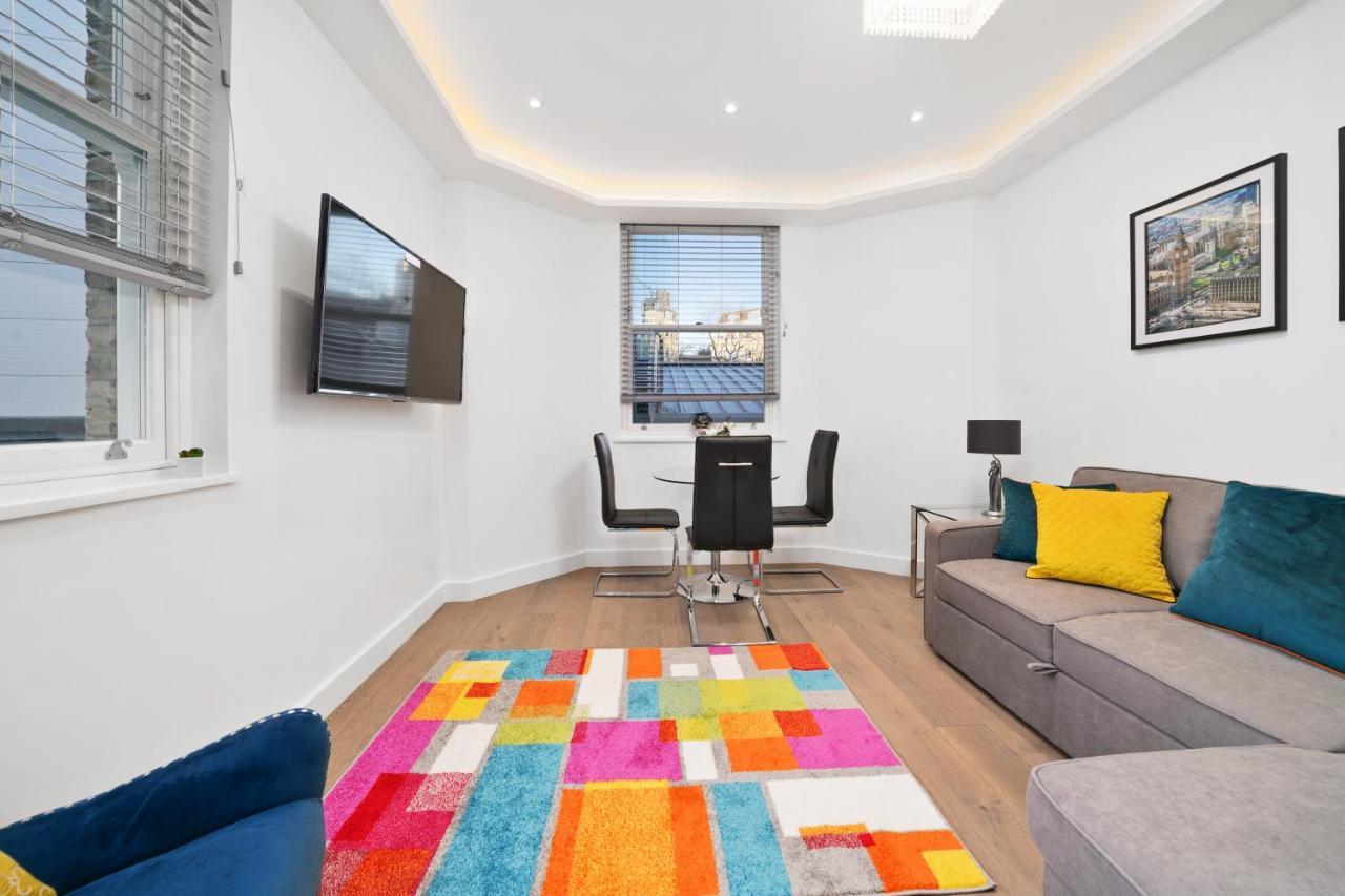 City Prime Apartments London Exterior foto A living room in a serviced apartment in London