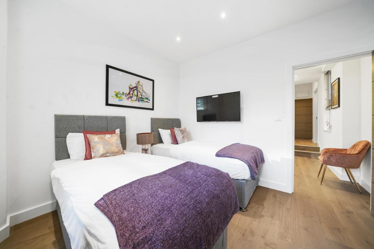 City Prime Apartments London Exterior foto A typical bedroom at the hotel